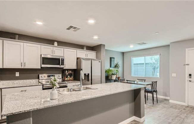 Beautiful townhome with amazing amenities, convenience in a desirable community.