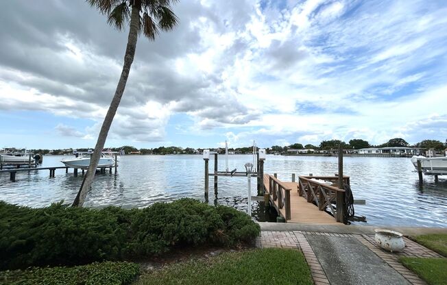 Classic waterfront Snell Isle Estates 3 Bed 2.5 Bath Home with private dock!