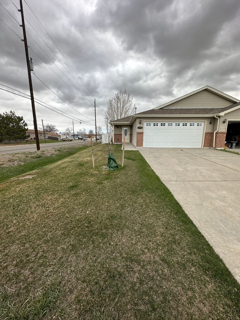 2 BEDROOM, PLUS OFFICE SPACE, 2 BATHROOM, SINGLE LEVEL TOWNHOME WITH 2 CAR ATTACHED GARAGE
