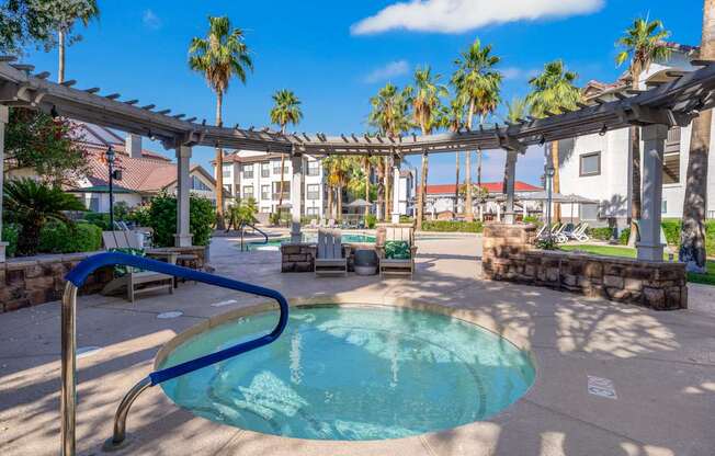 A pool with a blue metal railing.