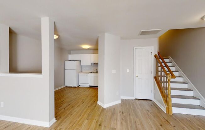 Townhome | Hard Surface Floors Through-Out The Home | Washer/ Dryer Included |Assigned Parking | Community Pool