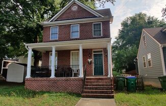 3 bedroom home with covered porch and rear yard