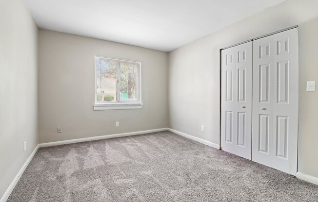 Welcome to a spacious and bright bedroom at The Preserve On Conley Apartments. With modern finishes and ample natural light, this retreat is perfect for your personal oasis. Schedule a tour today and envision your new home!