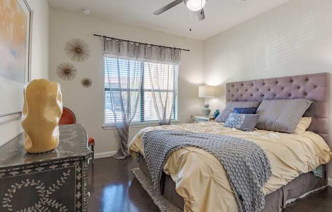 Bedrooms with Ceiling Fan, Large Window and Dresser