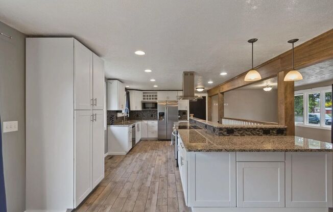 Spacious 5-Bedroom Home in Coveted Mead School District – Corner Lot Charm!