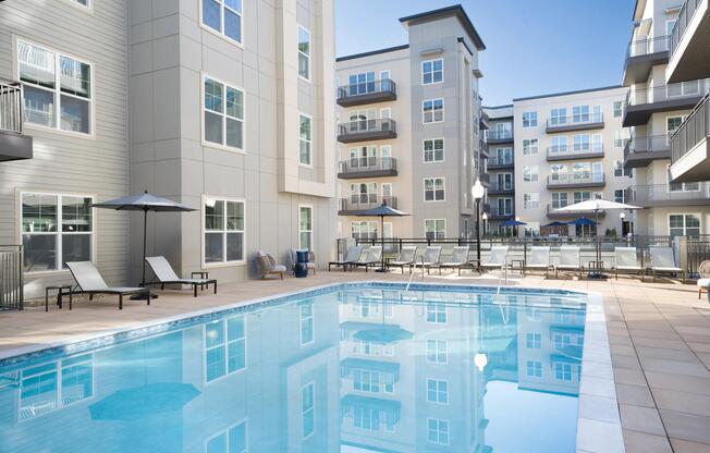 Our resort-inspired pool at Modera Liberty Row offers space to unwind, lounge poolside, and enjoy warm Charlotte days from home.