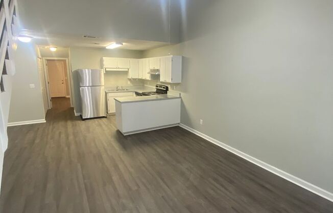 Freshly Remodeled 2 BR 2 BA Townhome Available Now! Beautiful New Flooring, Paint, And More!