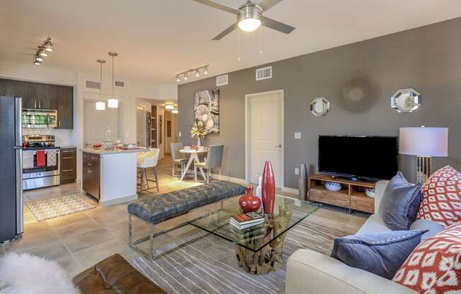 Living room with tiled floors at Palm Ranch Apartments in Davie, FL