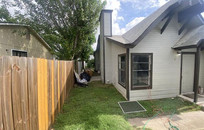 Large 2/2 duplex with a 2 car carport
