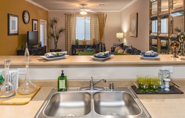 a kitchen with a sink and a counter top