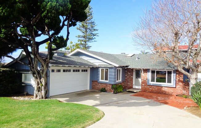 Rare find in Carlsbad! Beach bungalow in the Terramar community, just steps to the private beach access!