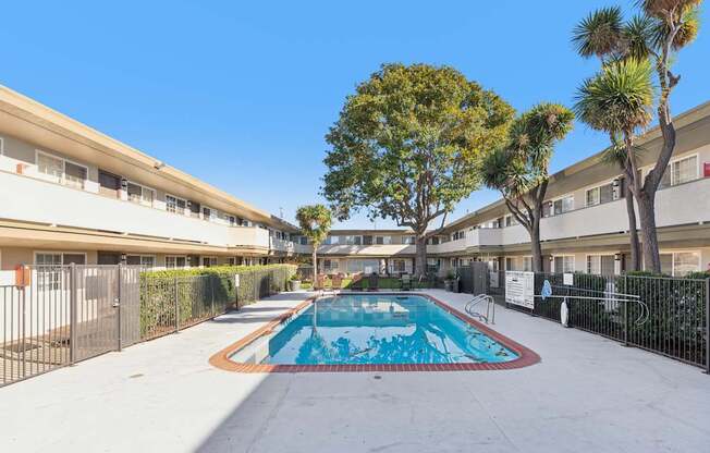 A swimming pool in the middle of a residential area.
