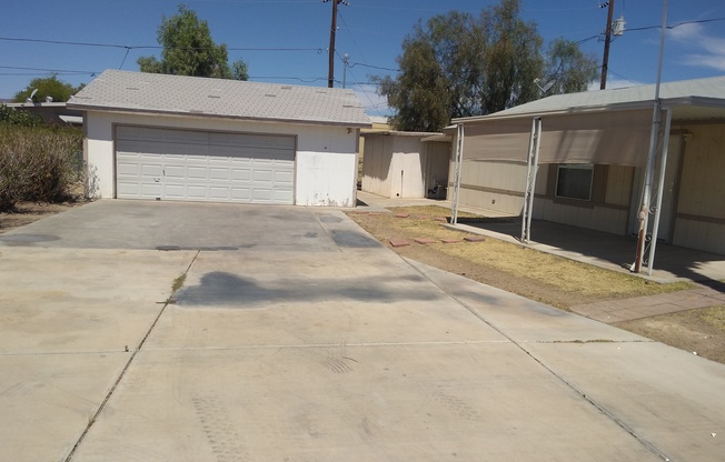 Double Wide on a Double Lot w/detached Garage!!