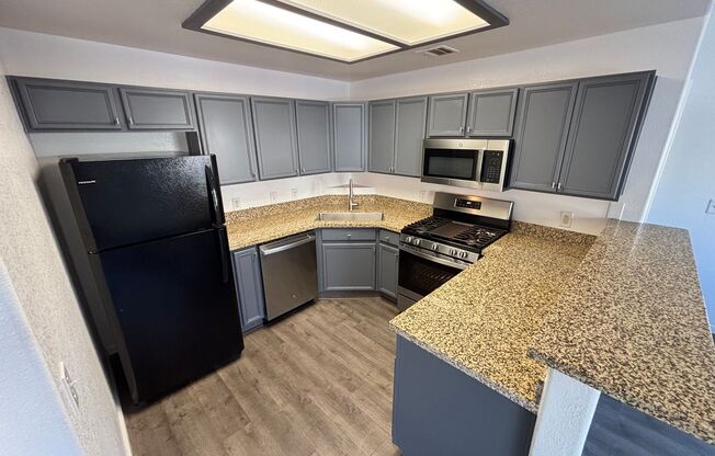 Modern 2bed/1.5bath  Condo nestled in a great area!