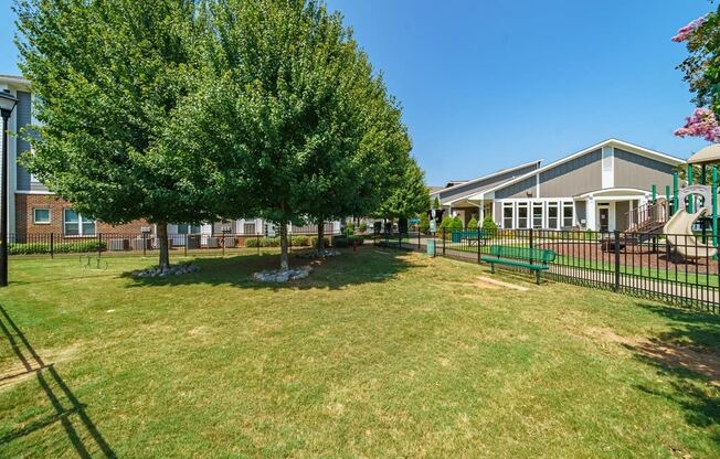 the preserve at ballantyne commons dog park with trees and benches