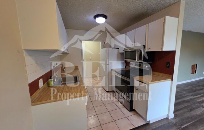 ADORABLE CENTRALLY LOCATED CONDO