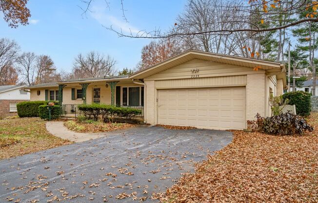 RARE SOUTHERN HILLS BEAUTY! 3 living rooms | 3 bedrooms | 2 bathroom | 2 car garage PLUS carriage house and storm shelter!