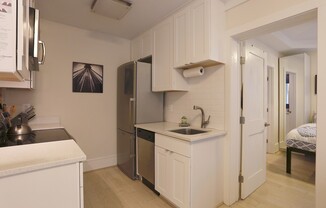 Parking Available! 1 Bedroom 1 Bathroom Corner Unit Condo// Columbia Heights // In Unit Laundry // Easy Walk to Metro!