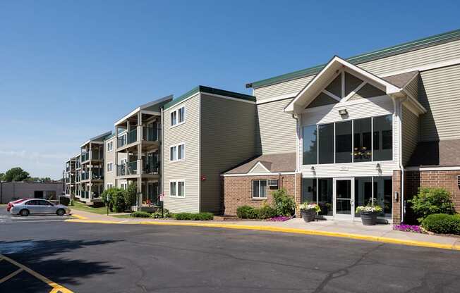 Frontside view of apartment building at Pheasant Park Apartments, New Hope, MN, 55428-5401