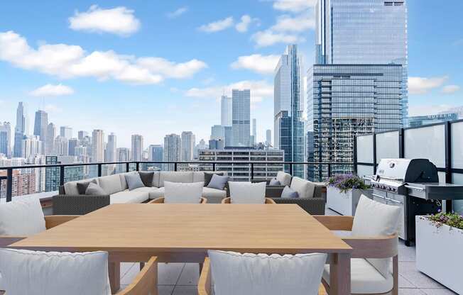 a communal terrace with a view of the city and a table and chairs at Cassidy on Canal, Chicago, Illinois, 60606