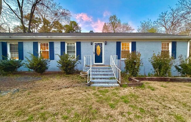 Charming Ranch with Fireplace, Two Living Areas & Large Lot – Minutes to Downtown