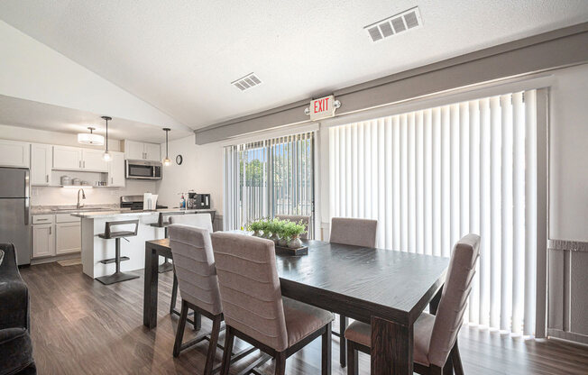 Renovated kitchen with dining area at West Wind Apartments, Fort Wayne, IN