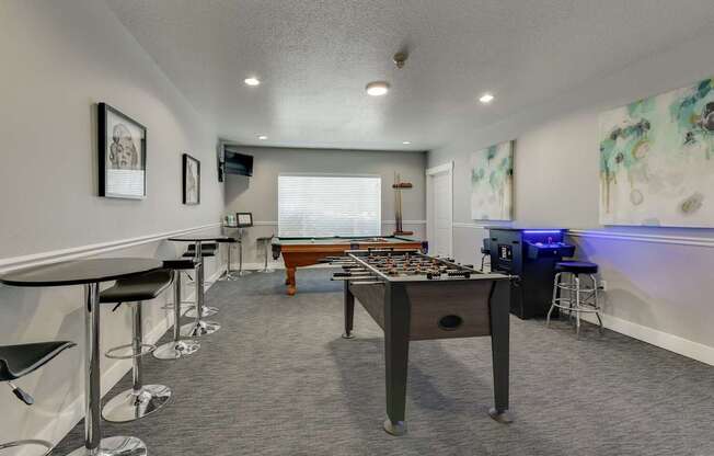 Community Clubhouse with Game Tables at Landings at Morrison Apartments located in Gresham, OR.