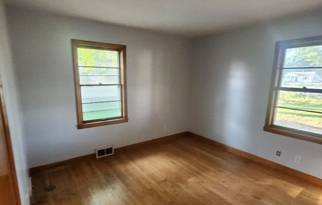 Charming 2 bedroom 1 bath with large rooms and attached carport - unfinished basement!
