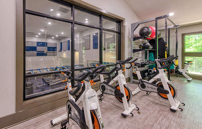 Wynnwood Vinings two story fitness center interior room filled with lots of bikes and exercise equipment