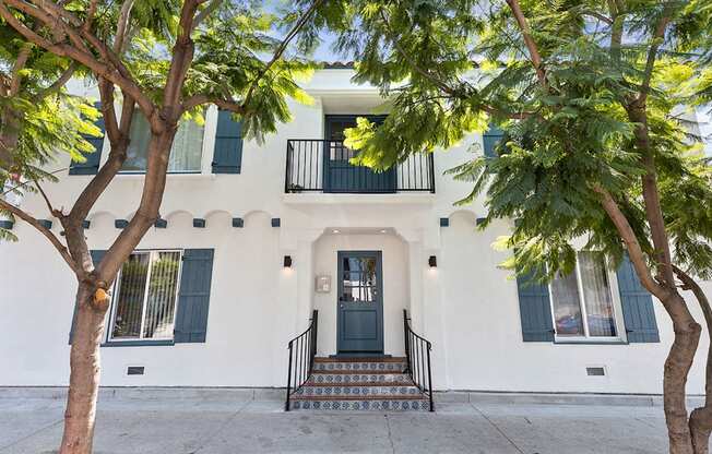 Property Front Entrance with Trees at Barton Apartments in Hollywood, California