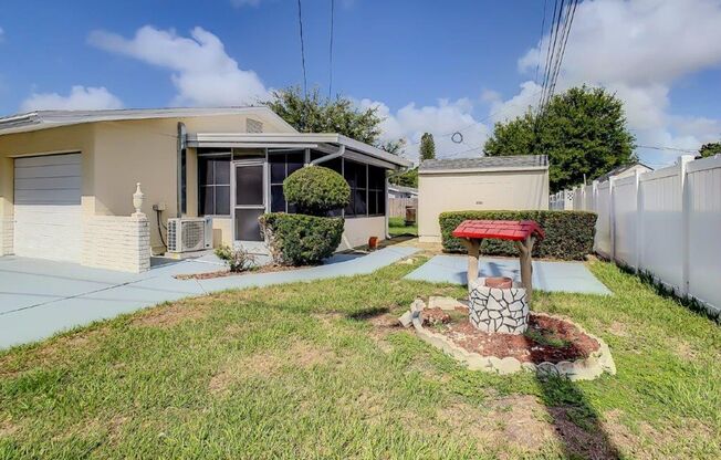 Beautiful 2/2 ~1000Sq. Ft. with NEW floors, recently updated Kitchen with GRANITE!!