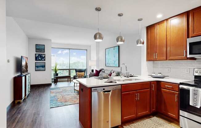 Midtown Crossing Apartments has floor-to-ceiling windows that fill this 1 bedroom apartment with bright natural light.