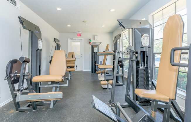 the gym at the enclave at woodbridge apartments in sugar land, tx