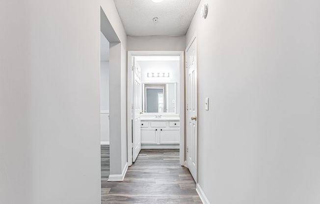 Hallway with wood like flooring at Parkside at Sandy Springs Atlanta, GA