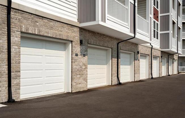 A row of garage doors are closed.