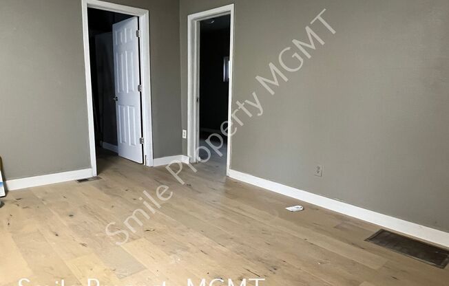 A nice house with 3 beds rooms and 1.5 baths.