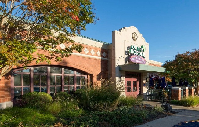 the facade of a building with a sign for a coffee shop