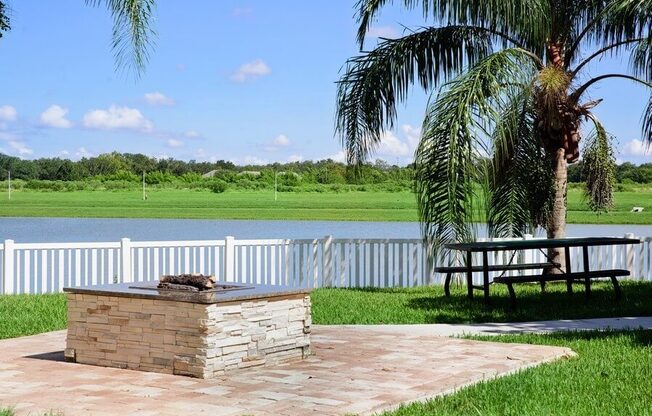 Outdoor picnic area with view of lake