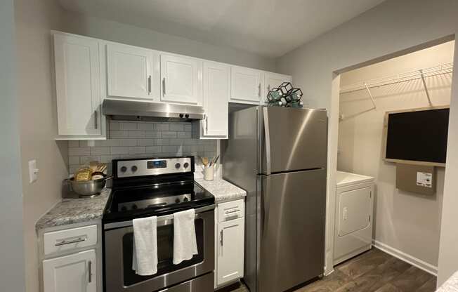 modern kitchen featuring stainless steel appliances at Palmetto Place, Fort Mill