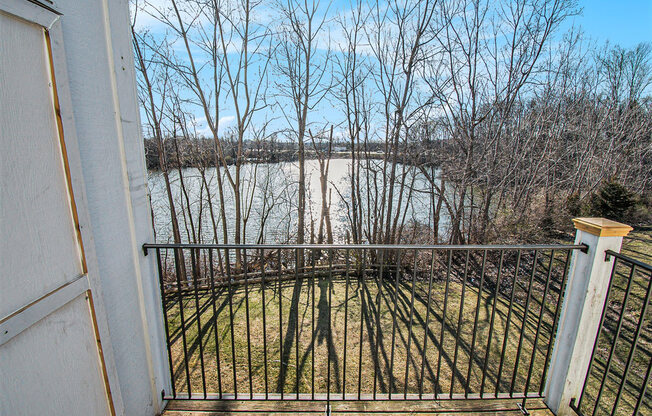 Balcony view overlooking a pond at Canal 2 Apartments, Lansing, Michigan