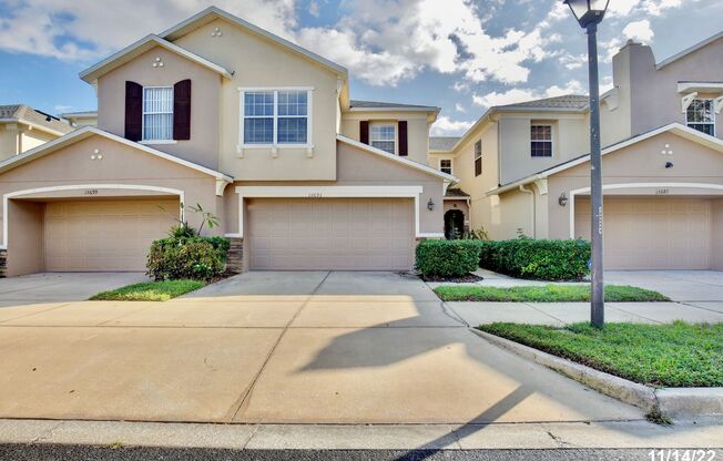 Beautiful 3/2.5 Spacious Townhome with a 2 Car Garage in the Gated Community Orchard - Winter Garden!