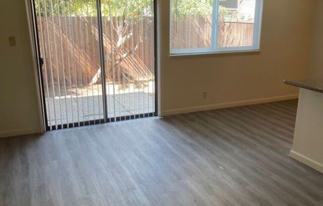 A Large two-bedroom in a modern building, with newly installed Hardwood Flooring