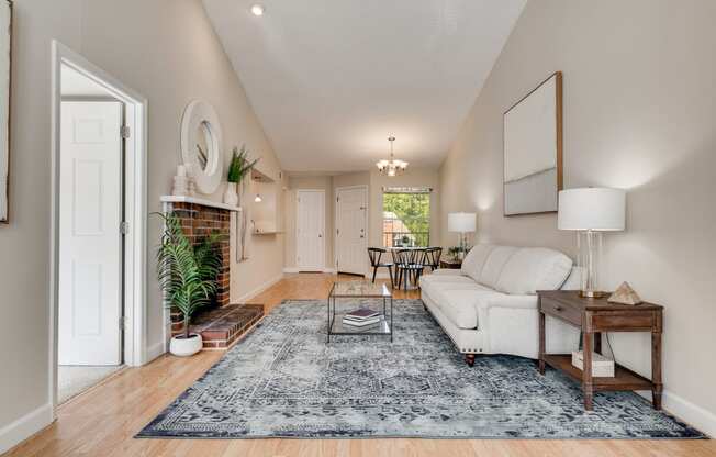 Living Room With Wood-Style Flooring & Fireplace