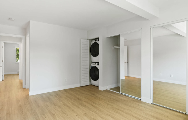 Bedroom with In-home Washer and Dryer