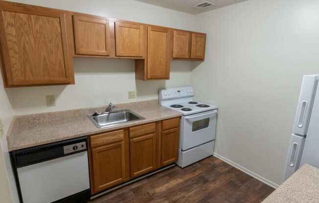 This is a photo of the kitchen in the 938 square foot , 2 bedroom, 2 bath apartment at Blue Grass Manor Apartments in Erlanger, KY.
