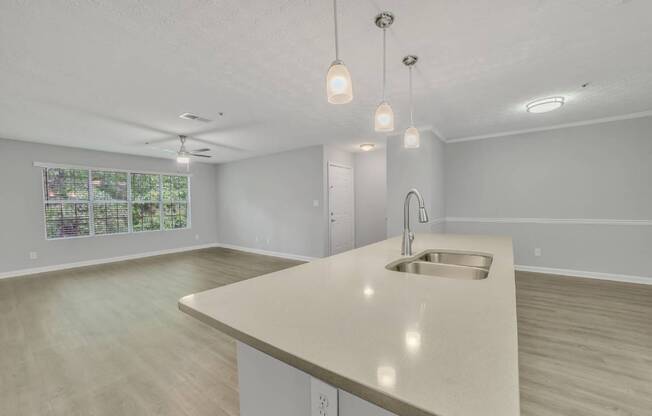 A kitchen with a countertop and a sink.