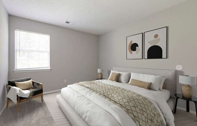 A bedroom with a large bed and two framed pictures on the wall.