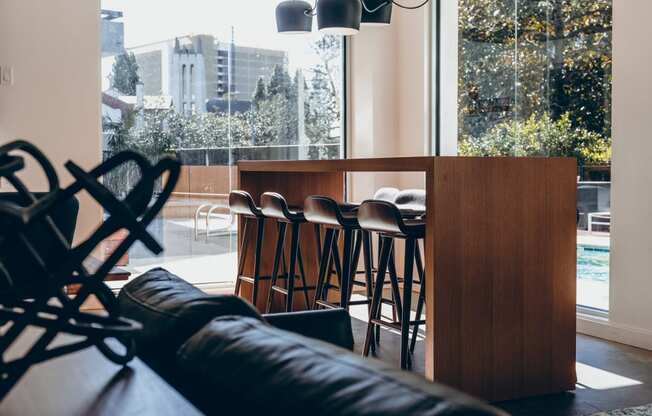 Study and conference kitchen bar with pool view