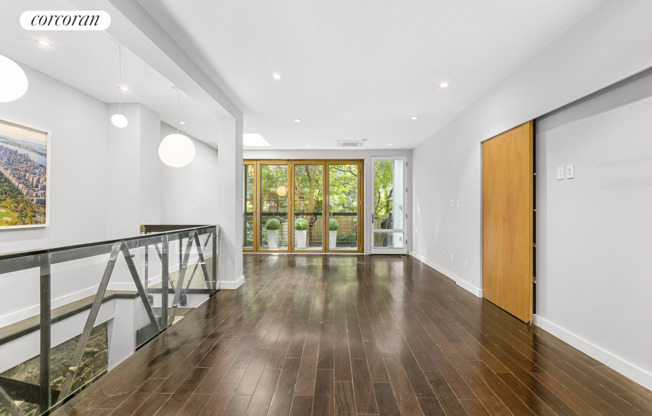 448 W 25 ST