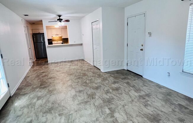 Charming 2 bedroom 1-bathroom Duplex unit features a prime location